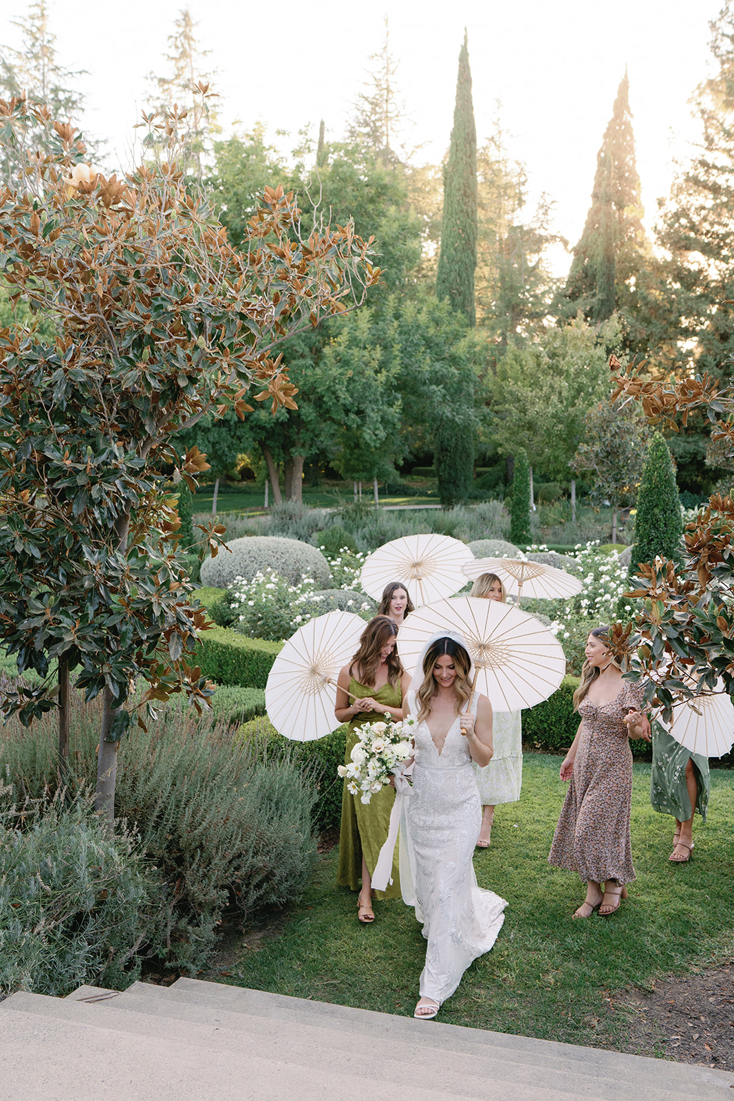 Bride with her girls and parasols